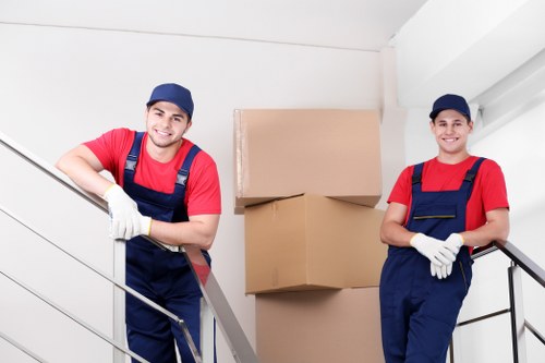 Organised office relocation boxes and furniture in Lewisham