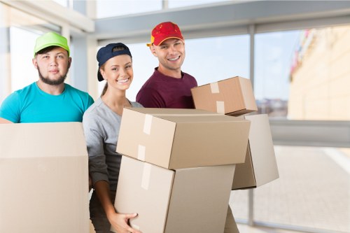 Well-packed boxes and furniture in a Lewisham storage unit