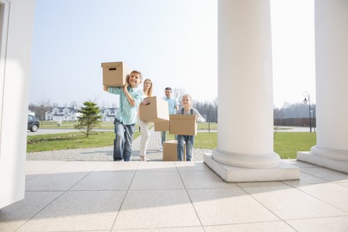 Professional movers handling a flat removal in Lewisham