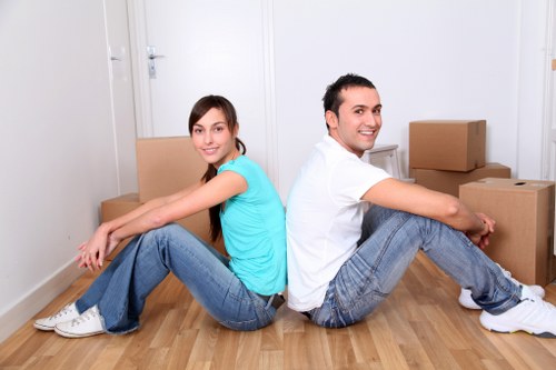 Neatly packed furniture and boxes in a Lewisham storage room