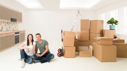 Packed boxes and furniture ready for secure storage in Lewisham